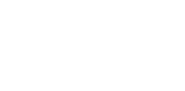 Photo of a man in a room using a tablet computer